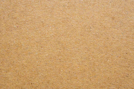Brown paper eco recycled kraft sheet texture cardboard backgroundの写真素材