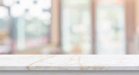 marble table top with blurred kitchen cafe restaurant interior background