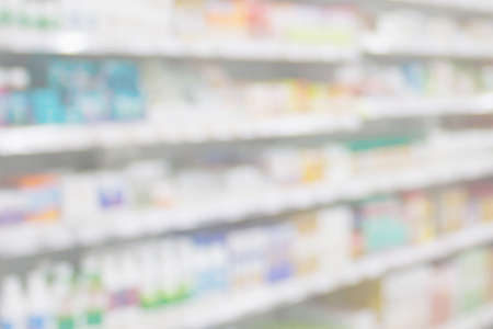 Pharmacy drugstore shelves interior blur medical backgroundの写真素材