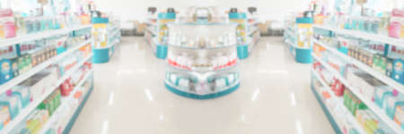 Pharmacy drugstore shelves interior blur medical backgroundの写真素材