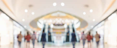 Abstract blur clothing boutique display interior of shopping mall backgroundの写真素材