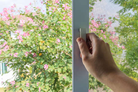 Hand hold mosquito net wire screen handle on house window