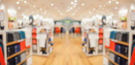 Abstract blur clothing boutique display interior of shopping mall background