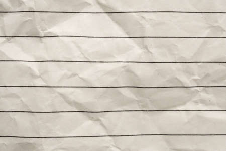Blank crumpled lined notebook paper texture backgroundの写真素材