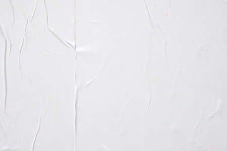 white crumpled and creased paper poster texture backgroundの写真素材