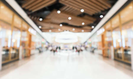Abstract blur modern shopping mall interior backgroundの写真素材