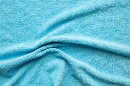 Blue towel fabric texture surface close up backgroundの写真素材