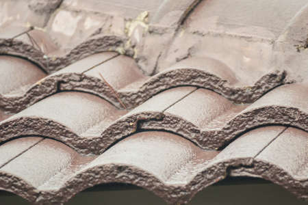 Ceramic roof tiles on the houseの写真素材