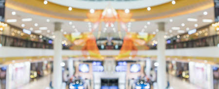 Abstract blur modern shopping mall interior background