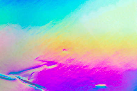 Crumpled Holographic rainbow foil iridescent texture abstract hologram background