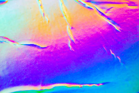 Crumpled Holographic rainbow foil iridescent texture abstract hologram background