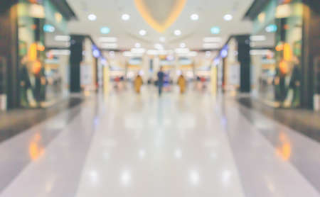 Abstract blur modern shopping mall interior backgroundの写真素材