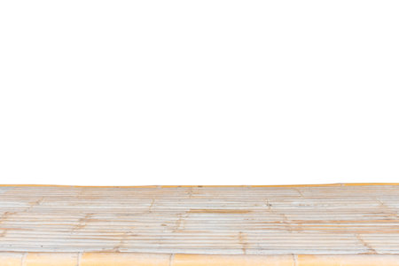 Empty bamboo wood table top isolated on white backgroundの写真素材
