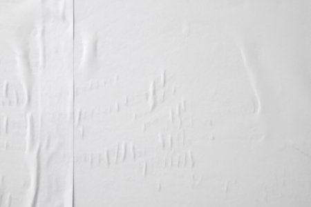 white crumpled and creased paper poster texture backgroundの写真素材