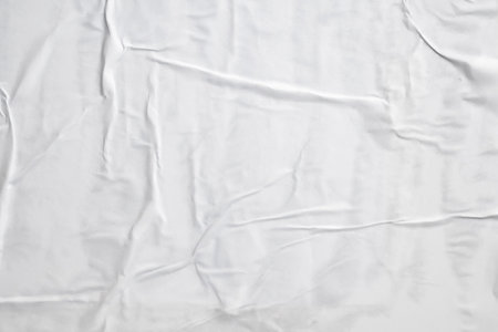 white crumpled and creased paper poster texture background