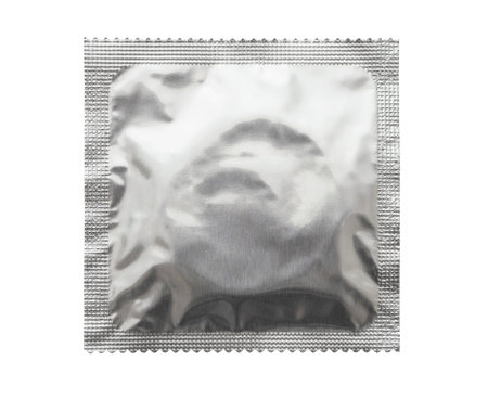 Blank aluminium foil condom wrapper packaging mockup isolated on white backgroundの写真素材