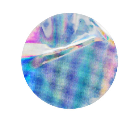 Blank round adhesive holographic foil sticker label isolated on white backgroundの写真素材