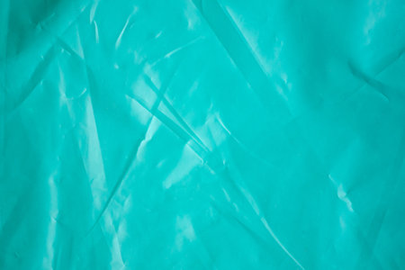 Blue wrinkled plastic bag texture background close upの写真素材