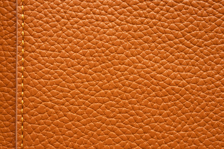 Brown leather texture background with stitchingの写真素材