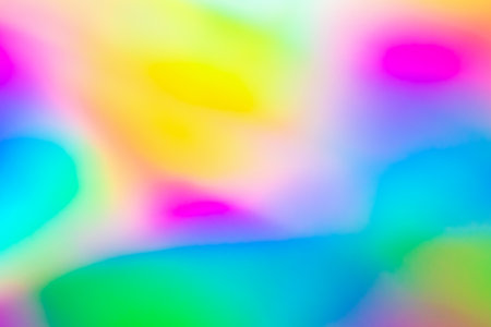 Abstract blur holographic rainbow foil iridescent background