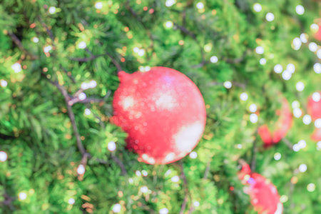 Abstract blurred christmas tree with bokeh light backgroundの写真素材