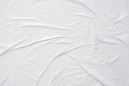 white crumpled and creased paper poster texture backgroundの写真素材