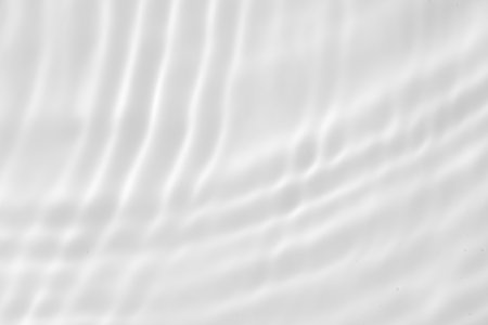 Abstract white transparent water shadow surface texture natural ripple backgroundの写真素材
