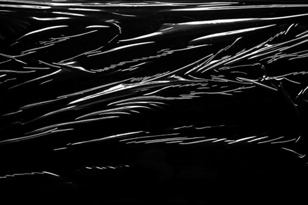 transparent plastic film wrap overlay texture backgroundの写真素材