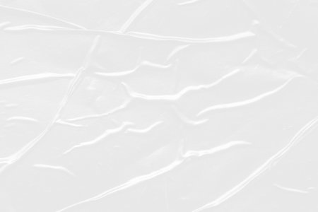 white crumpled and creased plastic poster texture backgroundの写真素材