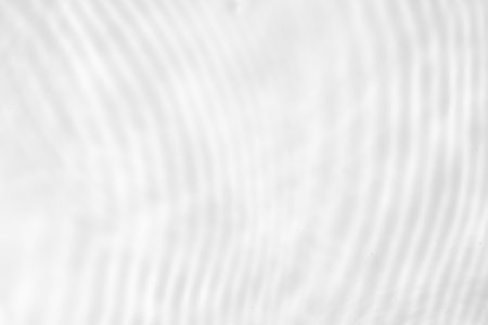 Abstract white transparent water shadow surface texture natural ripple backgroundの写真素材