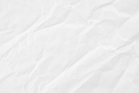 Abstract white crumpled and creased recycle paper texture backgroundの写真素材