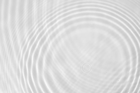 Abstract white transparent water shadow surface texture natural ripple backgroundの写真素材