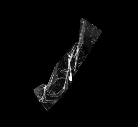 adhesive plastic tape isolated on black background