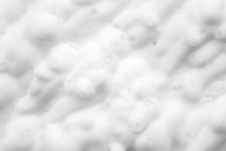 Abstract white soap foam bubbles texture backgroundの写真素材