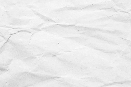 Abstract white crumpled and creased recycle paper texture backgroundの写真素材