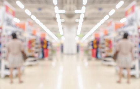 supermarket aisle and shelves blurred backgroundの写真素材