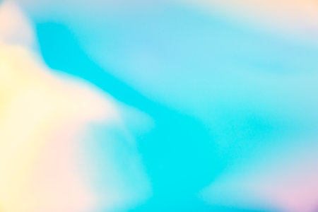 Abstract blur holographic rainbow foil iridescent background