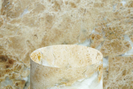 Brown marble podium mockup cylinder shape with marble background for product presentationの写真素材
