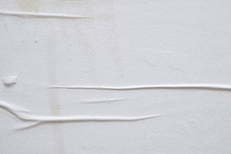 white crumpled and creased paper poster texture backgroundの写真素材