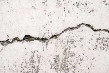 Grunge cracked concrete wall texture abstract backgroundの写真素材