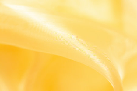 Abstract luxury gold fabric texture backgroundの写真素材