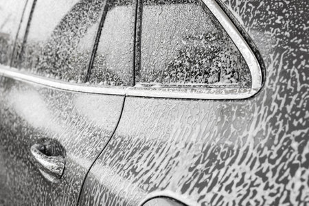 car cleaning and washing with foam soapの写真素材