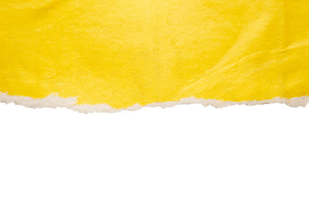 Yellow ripped paper torn edges strips isolated on white backgroundの写真素材