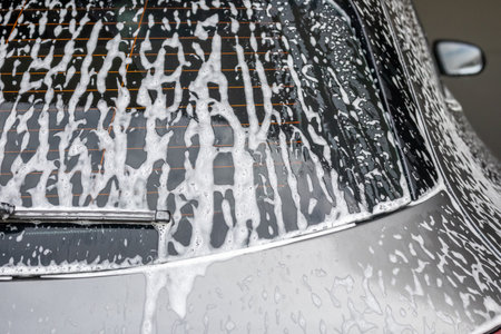 car cleaning and washing with foam soapの写真素材