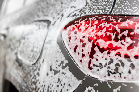 car cleaning and washing with foam soapの写真素材