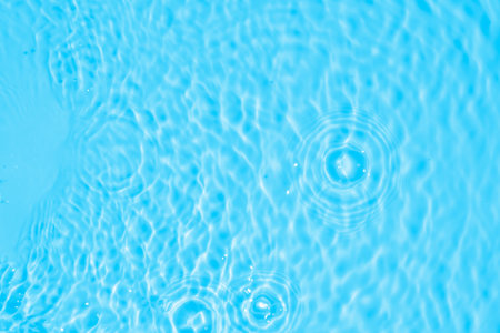 Abstract transparent water shadow surface texture natural ripple on blue background
