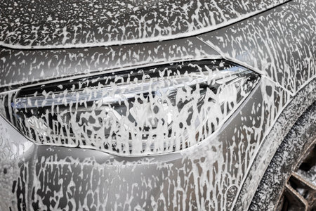 car cleaning and washing with foam soapの写真素材