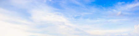 beautiful blue sky with clouds backgroundの写真素材