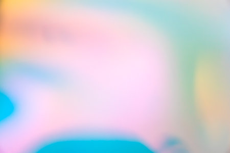Abstract blur holographic rainbow foil iridescent backgroundの写真素材