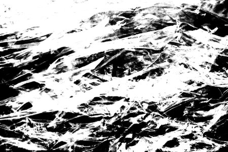 Abstract grunge black and white distressed texture backgroundの写真素材